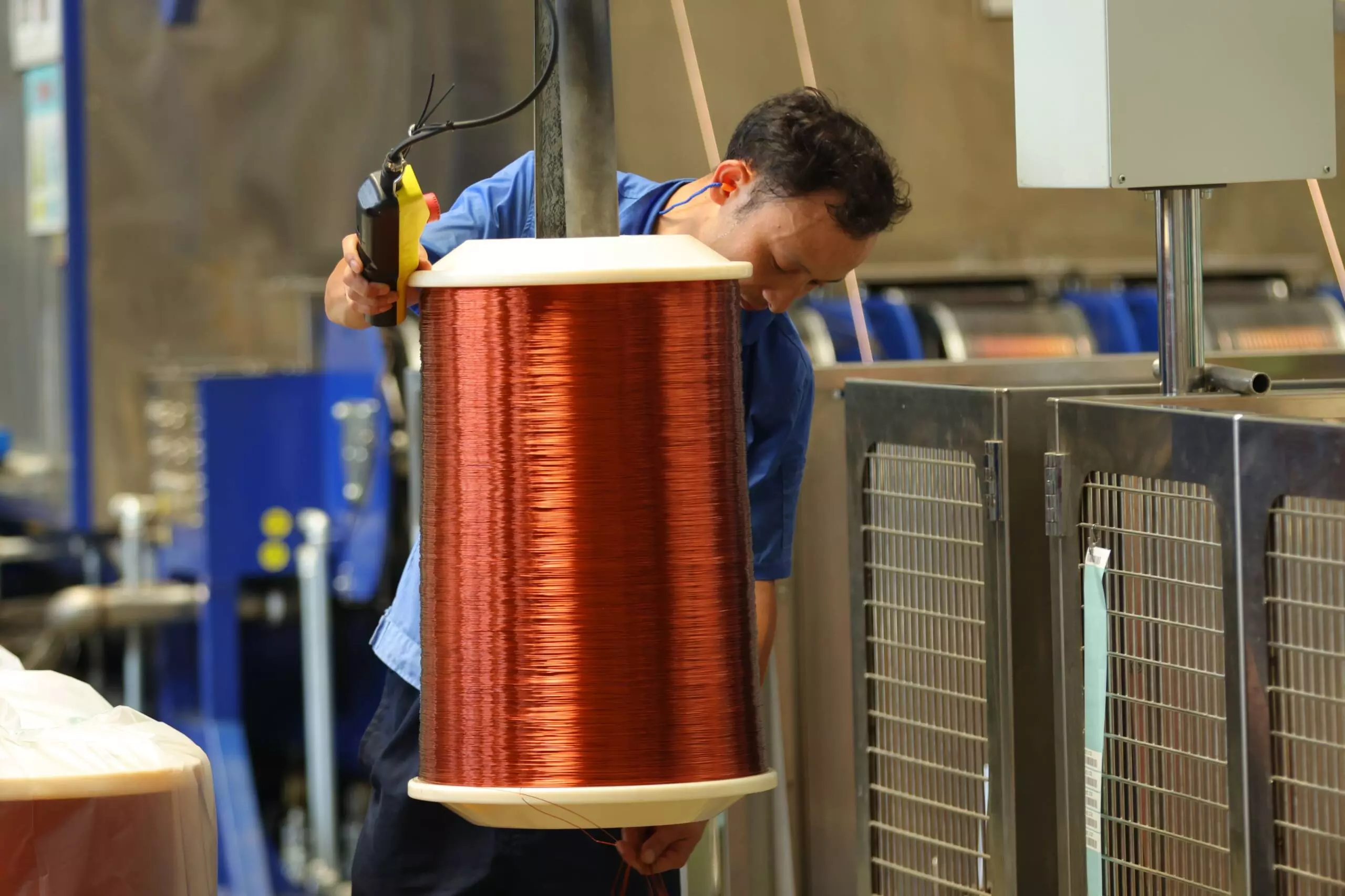 Workers are making magnet wire